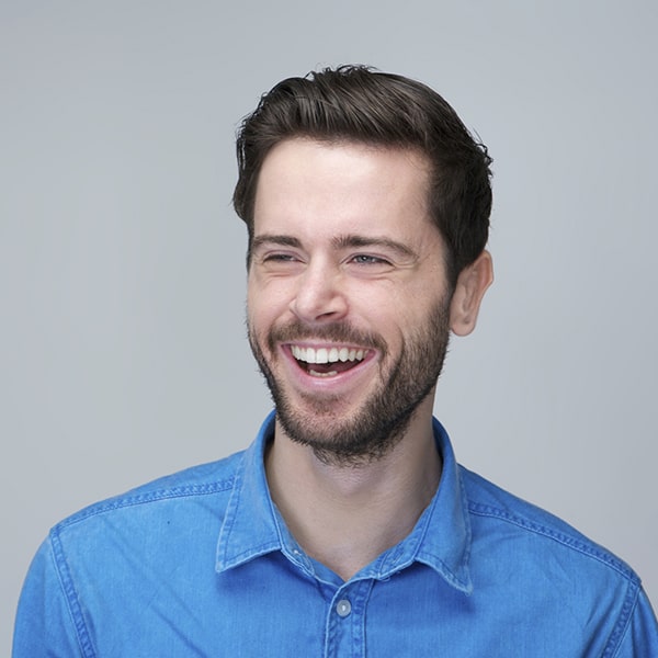 A man with smiling after his Inlay treatment