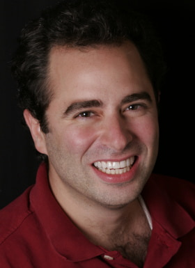 Dr. Jon Abeniam is smiling