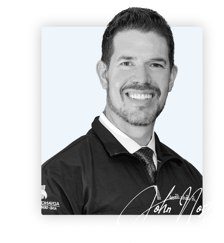 Meet Dr. John Nosti: Bringing Joy to Dentistry with a Smile A picture of Dr. Nosti smiling and wearing a coat and tie